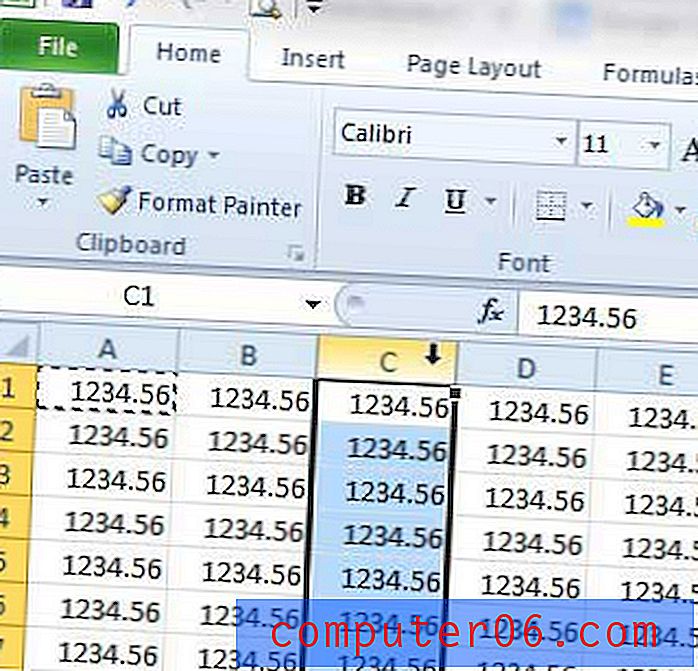 Jak automatycznie dodać symbol dolara w programie Excel 2010